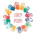 Colorful children handprints in the form of a circle. Kids palm prints around of the title. Solidarity or friendship