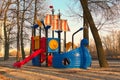 Colorful children playground, exercise for kids, activities in outdoor public park surrounded by trees in Hydropark Royalty Free Stock Photo