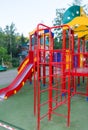 Colorful children's Playground with slides and swings outdoors in the Park in summer Royalty Free Stock Photo