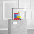 Colorful Children Wooden Toy Locomotive Train over Pedestal, Stage, Podium or Column with Glass Showcase Cube in Art Gallery or