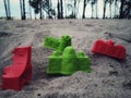 A colorful children& x27;s mini tower toy in the sand on a mangrove beach Royalty Free Stock Photo