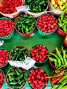 Colorful chili peppers at a farmer`s market stand Royalty Free Stock Photo