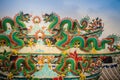 Colorful chinese dragon statues on roof in Chinese temple. Chine Royalty Free Stock Photo