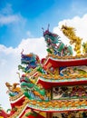 Colorful chinese dragon and swan sculpture on the rooftops of ch Royalty Free Stock Photo