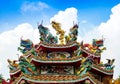 Colorful chinese dragon and swan sculpture on the rooftops of ch Royalty Free Stock Photo