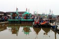 Colorful chinese fishing boat resting at a Chinese Fishing Village, Sekinchan, Malaysia Royalty Free Stock Photo