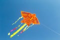 Colorful chinese kite flying in the blue sky Royalty Free Stock Photo