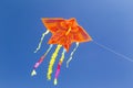 Colorful chinese kite flying in the blue sky Royalty Free Stock Photo