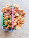 Colorful chips and dried fruits in a peddlers basket