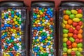 Colorful chocolate candy pills.Gumball machine filled with pills and drugs.Sweet food photo concept