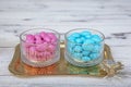 Colorful and chocolate covered almond candies in pastel tones in crystal sugar bowl. Traditional Turkish colorful coated almond Royalty Free Stock Photo