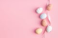 Colorful chocolate easter eggs. Sweet candy eggs on pink background Royalty Free Stock Photo