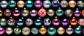 Colorful Christmas baubles on black background . Royalty Free Stock Photo