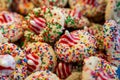 Colorful Christmas cookies made with peppermint kisses and rainbow sprinkles, selective focus