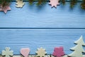 Colorful Christmas cookies of various shapes and spruce tree