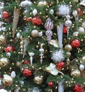 Colorful Christmas decorations hanging on a tree