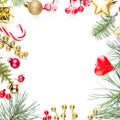 Colorful Christmas frame with red and gold decor and green Xmas tree twig on white background Royalty Free Stock Photo