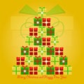 Colorful christmas gifts stacked on top to each other in the form of a christmas tree with christmas and new years greetings Royalty Free Stock Photo