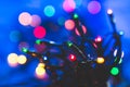 Colorful Christmas lights with bokeh Royalty Free Stock Photo