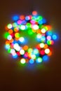 Colorful Christmas lights wreath bokeh