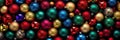 Colorful Christmas ornament balls abstract background. Holiday cheerful decorations. Rainbow glass bulbs wallpaper x-mas