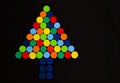 Colorful Christmas tree made of plastic bottle caps Royalty Free Stock Photo