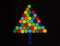 Colorful Christmas tree made of plastic bottle caps Royalty Free Stock Photo