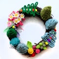 Colorful Christmas wreath handmade ornament for garland from pine tree, flower, fruit, leaf, wonderful craft decoration