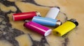 Colorful cigarette lighters on marbl Royalty Free Stock Photo