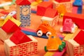 Colorful city on a orange background toys cars aeroplanes houses Royalty Free Stock Photo