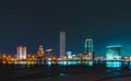 Colorful cityscape of Yekaterinburg at night reflecting in water