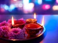 Colorful clay diya lamps lit during diwali celebration