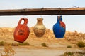 Colorful clay jugs hanging on line in Goreme. Cappadocia. Turkey Royalty Free Stock Photo