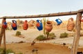 Colorful clay jugs hanging on line in Goreme. Cappadocia. Turkey Royalty Free Stock Photo