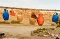 Colorful clay jugs hanging on line in Goreme. Cappadocia. Turkey Royalty Free Stock Photo