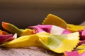 Colorful close up of pasta on a wooden surface