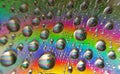 Colorful of close up rainbow droplets. Royalty Free Stock Photo