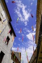 Colorful closed umbrella bounded street decoration in Jonzac town france