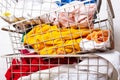 Pile of dirty, colorful laundry in baskets.