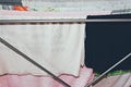 Colorful clothes hanged for drying after laundry clothes airer, clothes dryer Royalty Free Stock Photo