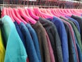 colorful clothes hanging for sale, discounted prices on every major holiday Royalty Free Stock Photo