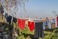 Colorful clothes on a laundry line and sun shining Royalty Free Stock Photo