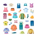 Colorful clothes for little ones set. Stylish baseball caps and shoes dresses for toddlers beautiful tshirts and Royalty Free Stock Photo