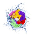 Colorful clothes rotates in a swirling splashes of water Royalty Free Stock Photo