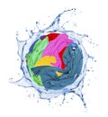 Colorful clothes rotates in a swirling splashes of water Royalty Free Stock Photo