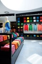 Colorful clothes shop interior Royalty Free Stock Photo