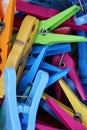 Heap of colorful clothespins are lying in a box Royalty Free Stock Photo