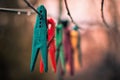 Colorful clothespins on the rope. Royalty Free Stock Photo