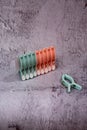 clothing clips isolated on gray cement background