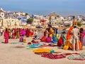 The colorful clothing of Indian Hindu pilgrims at Pushkar Lake.